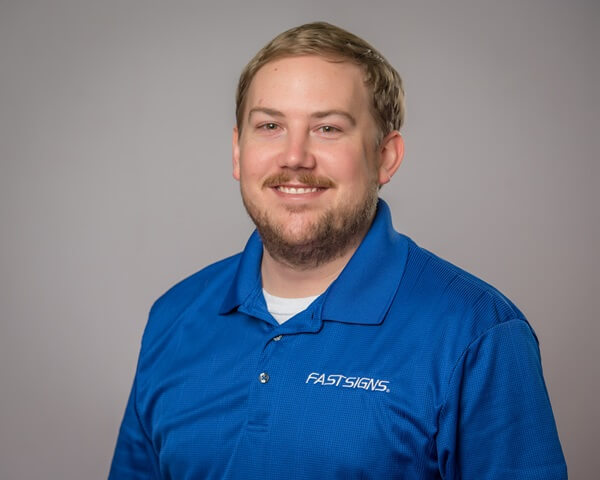 A headshot of Grant Walker